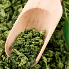 Dried green tea leaves, the source of L-theanine